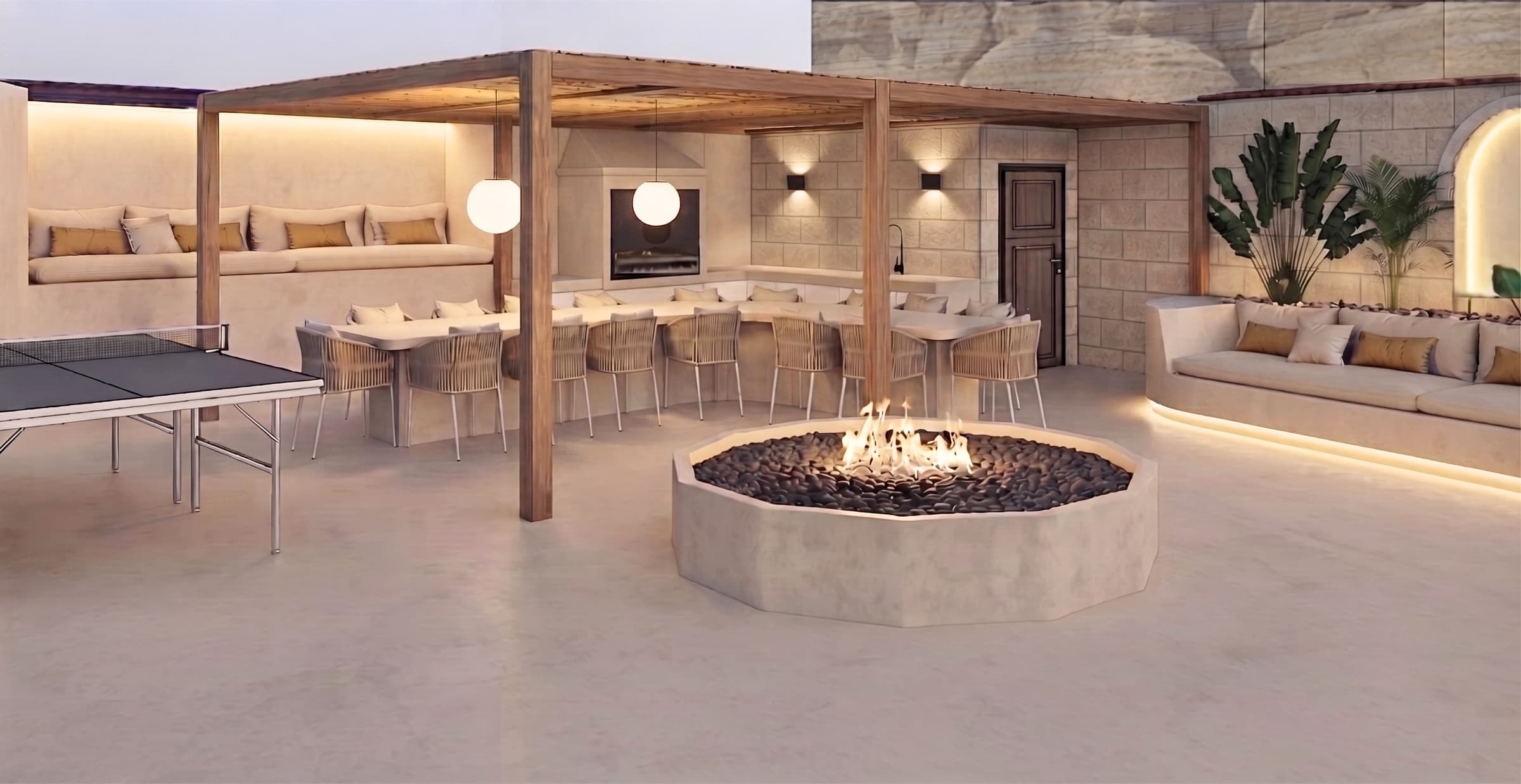Fire pit, pergola dining table and outdoor lounge at dusk